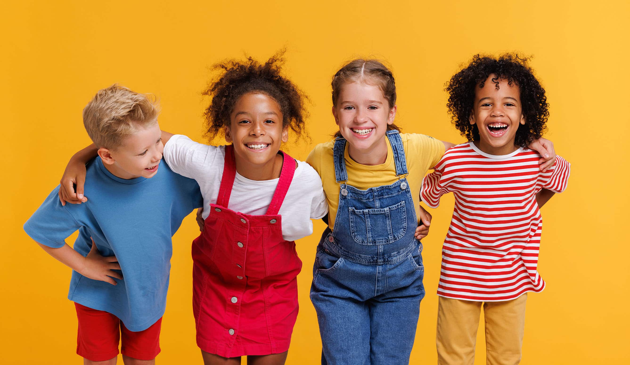 group of kids smiling Honey Bee Pediatric Co in Lawrence, KS