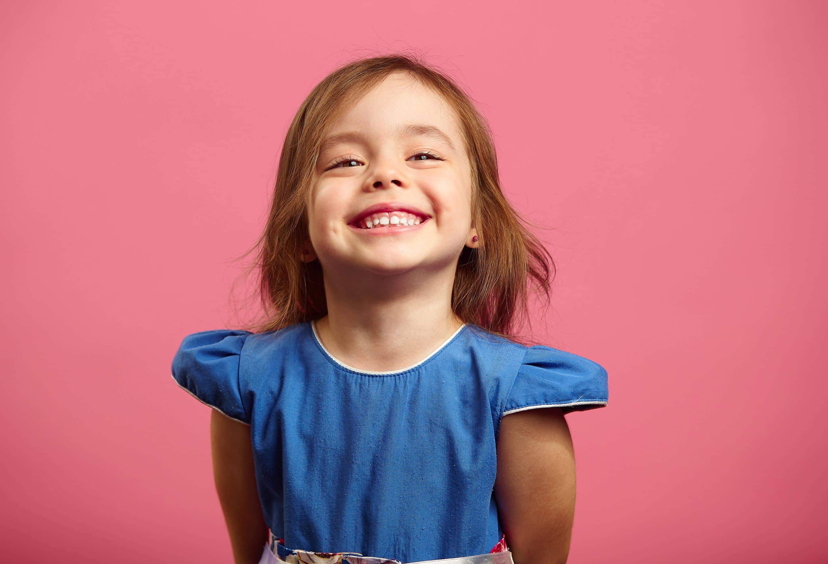 Child after a Dental exam in Lawrence and Lenexa KS at Honey Bee Pediatric Dental Co.