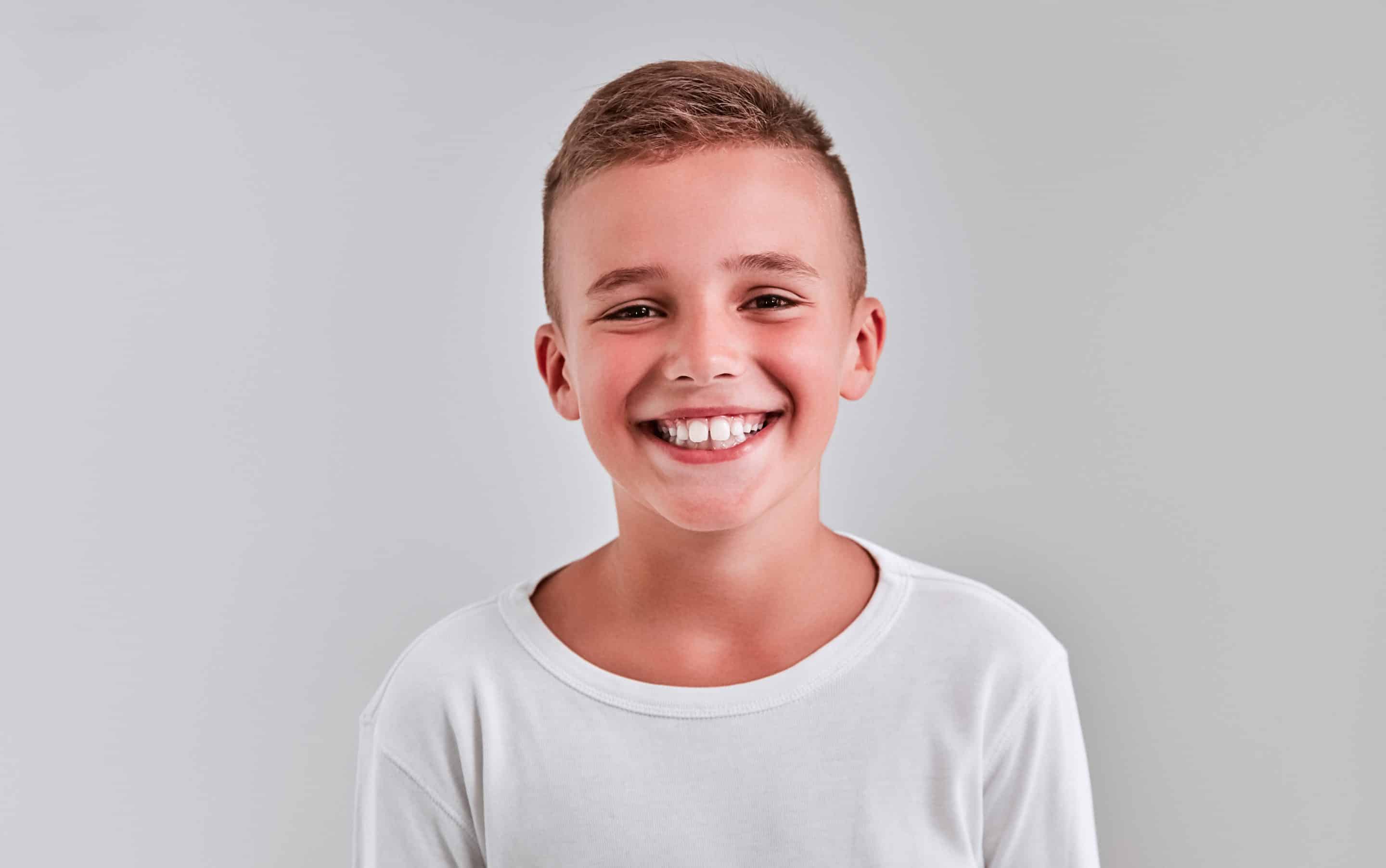 Child after a routine dental cleaning in Lawrence and Lenexa, KS