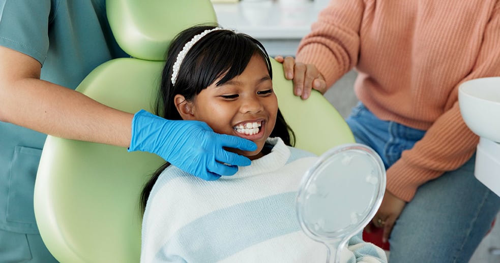 girl during dental appointment at Honey Bee Pediatric Dental Co