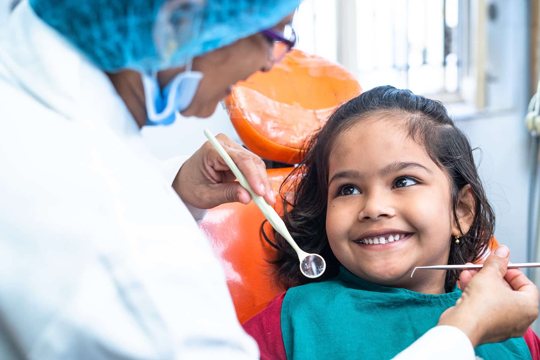 Girl at a pediatric dentist in Kansas