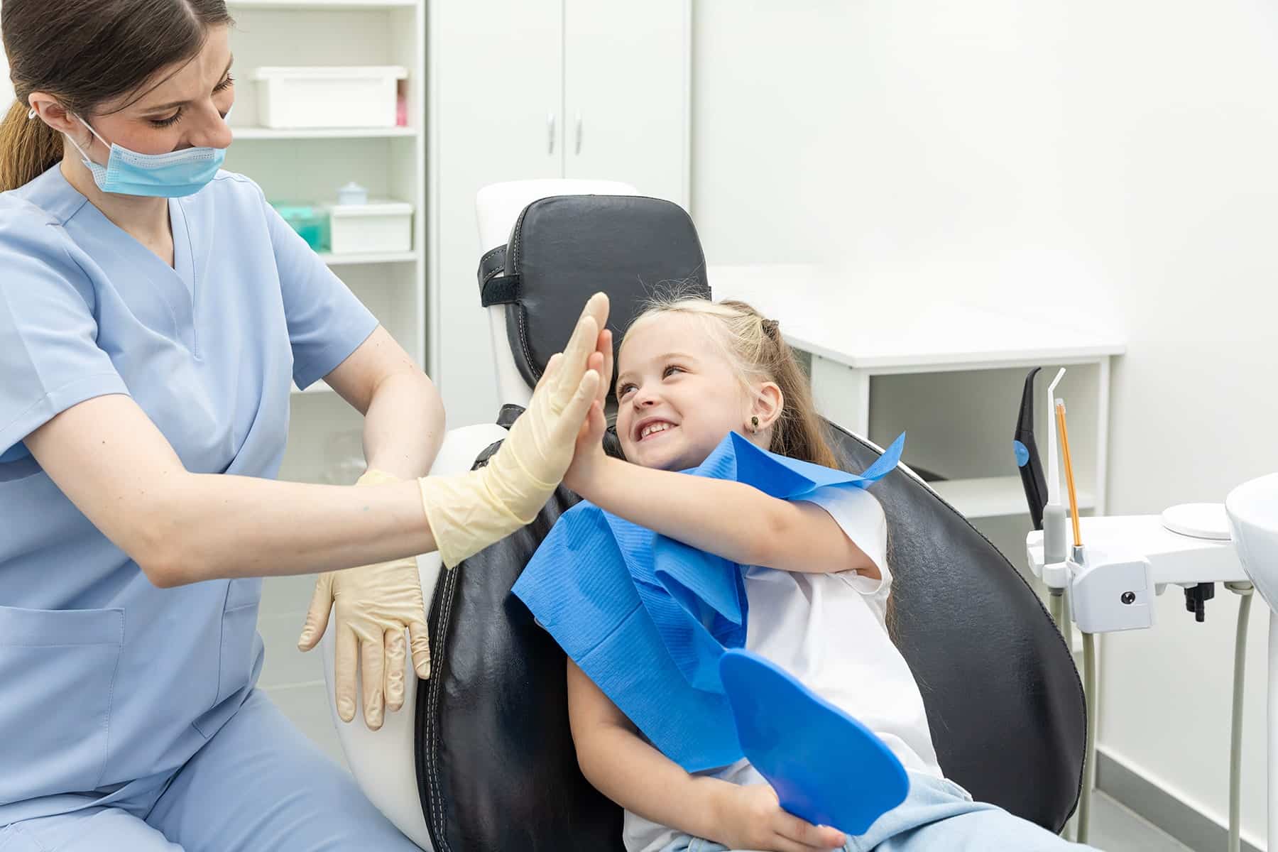 Child visiting the pediatric dentist in Lenexa, KS