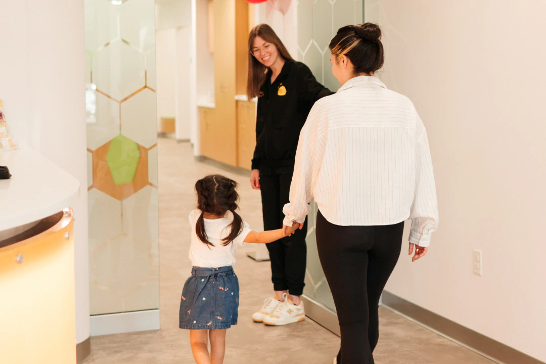 Child after a visit to the pediatric dentist in Lawrence and Lenexa KS at Honey Bee Pediatric Dental Co.