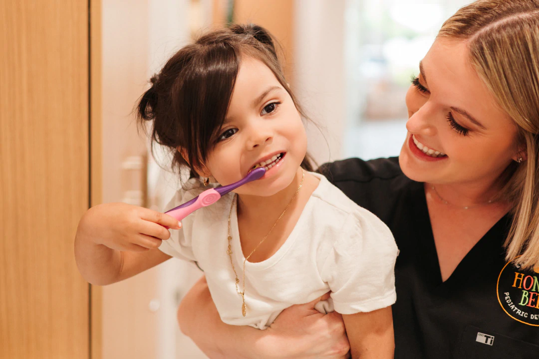 Girl getting Dental Crown treatment to restore dental health in Lawrence and Lenexa, KS.