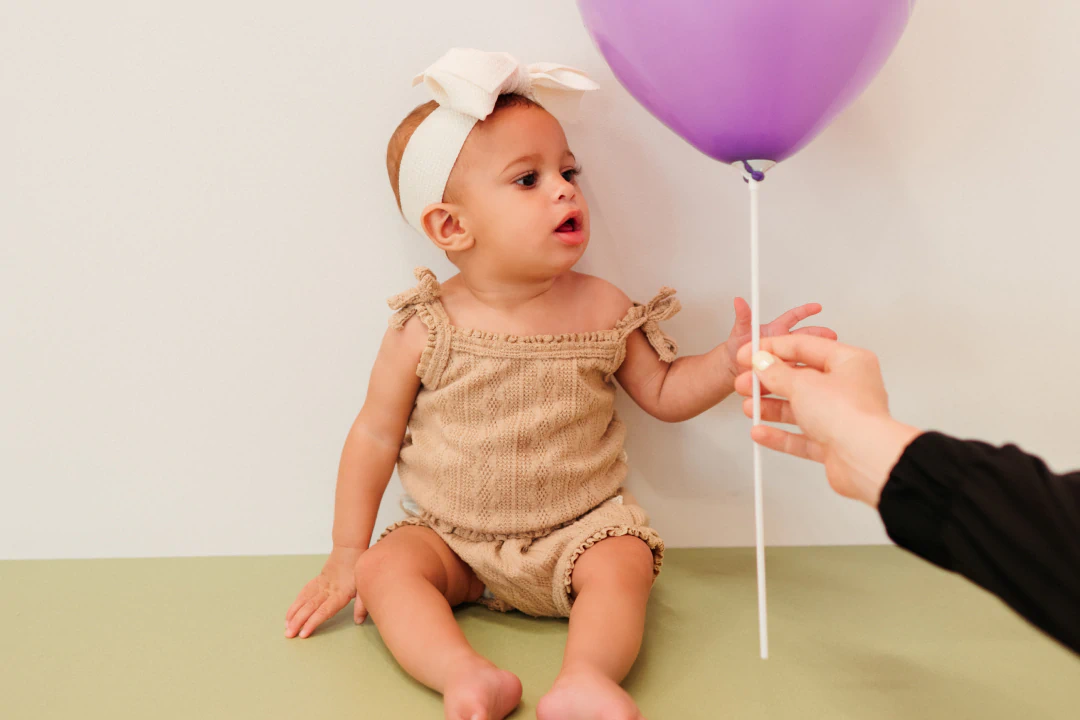 Young girl getting a comprehensive dental exam and cleaning in Lawrence, KS and Lenexa, KS